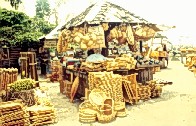 Sieves Stand at the Market. Copyright by Sheila Thomson. All rights reserved.